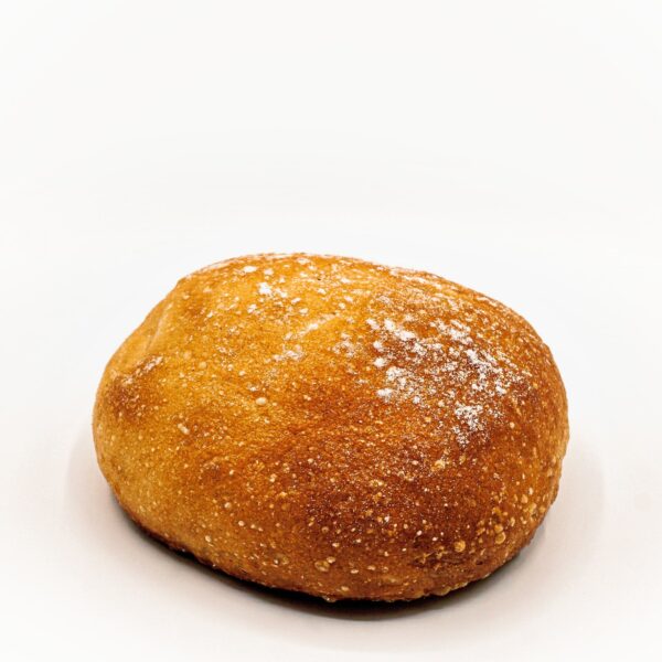 Pieza de pan redondeada, de miga esponjosa y con una corteza dorada muy suave sin gluten pieza completa