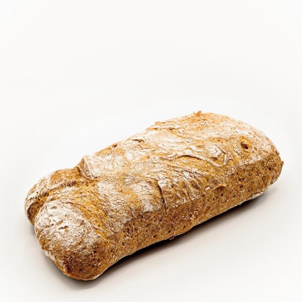 Pieza de pan de miga suave, esponjosa y alveolada con corteza crujiente. SIN GLUTEN